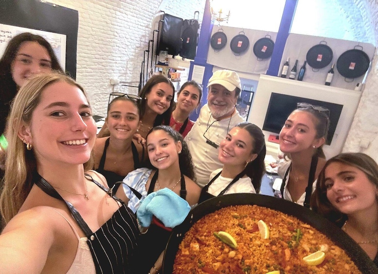 Picture 2 for Activity Madrid: Cook your own paella and unlimited sangria at a hands-on workshop 2