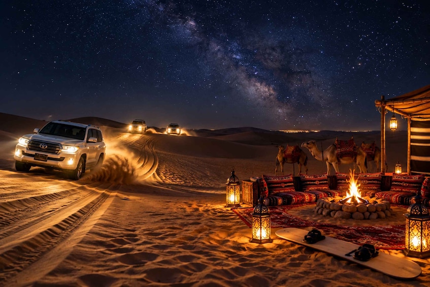 A desert scene with a vehicle driving on a sandy road, a campfire, and a starry night sky. 1