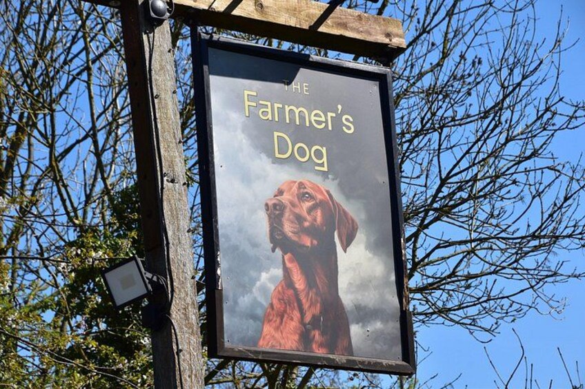 A sign with a dog and the text 'The Farmer's Dog'. 2