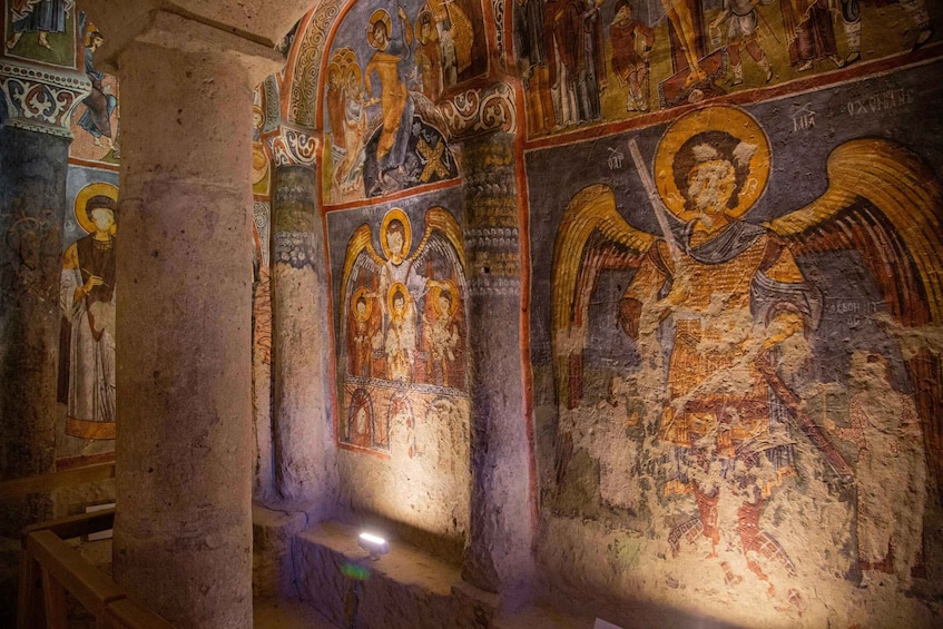 A mosaic with religious figures and architectural columns. 4