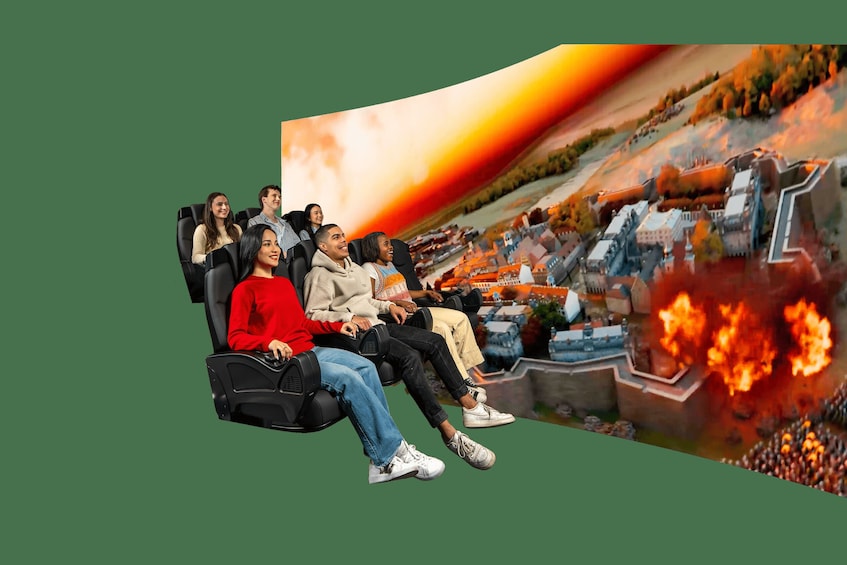 A group of people seated in a roller coaster. 4