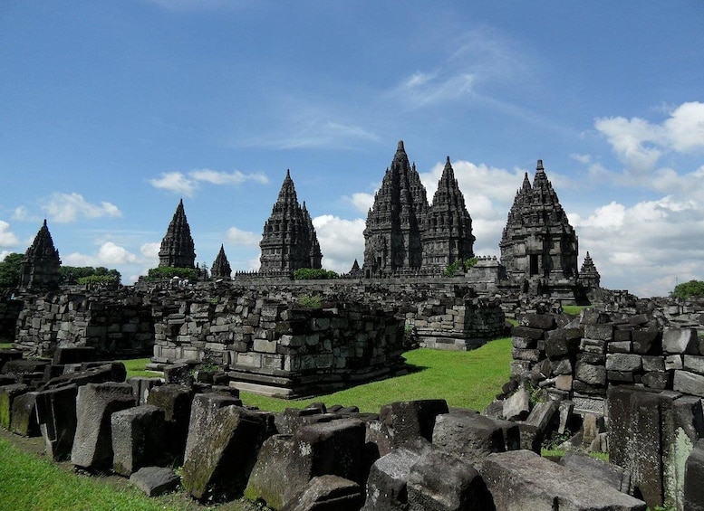 Ancient stone ruins with multiple temple structures. 4