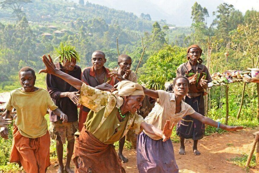 A group of people in a rural setting, possibly engaged in a traditional activity or celebration. 4