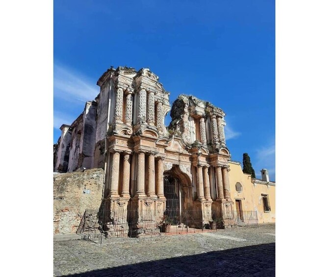 A historic building with ornate columns and intricate carvings. 5