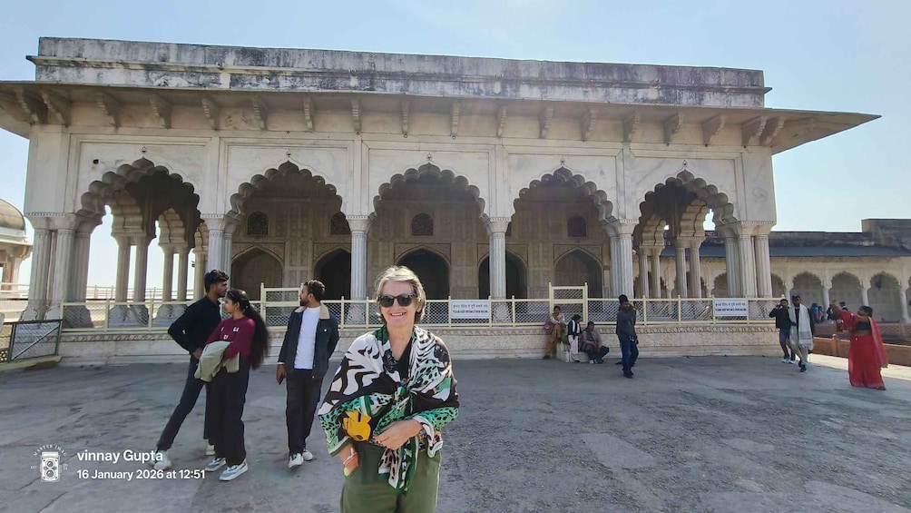 A historical building with arches and columns. 5