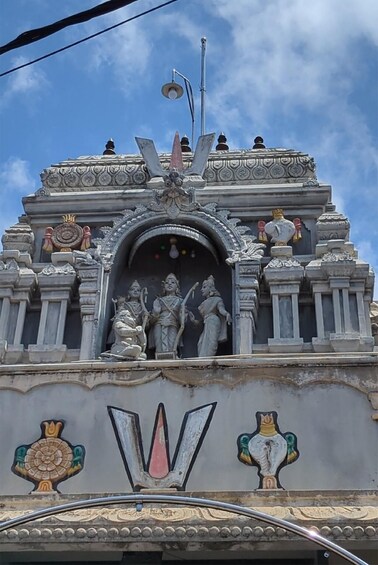 A temple with intricate carvings and statues. 2