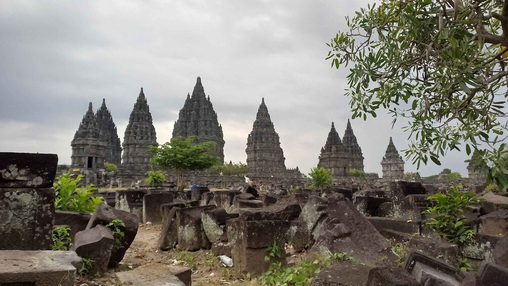 Ancient stone ruins with multiple temple structures. 2