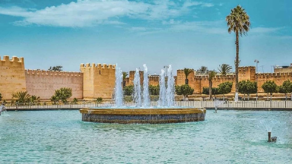 A historic fort with a central fountain. 1