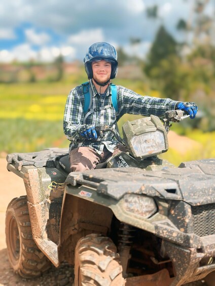 A person on a dirt bike in a rural setting. 3