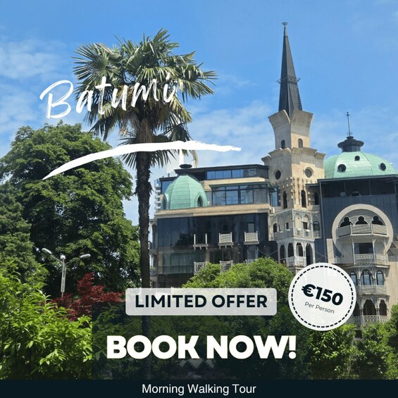 A historic building with a spire and green domes, surrounded by lush greenery and palm trees. 2