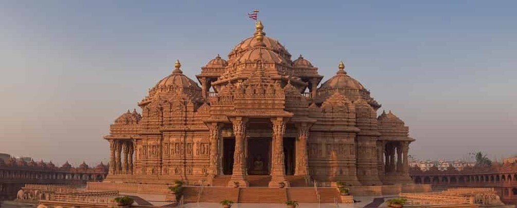 A large, ornate temple with multiple domes and intricate carvings. 1