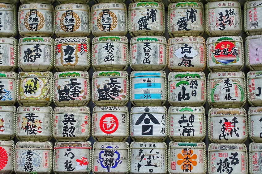 A wall of packaged goods with various labels and designs. 1