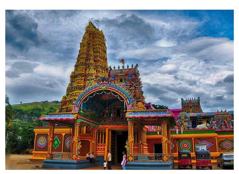 A colorful temple with intricate architecture and a large spire. 3