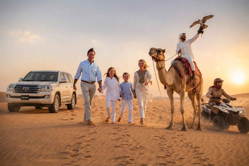 A family walking in a desert with a camel and a 4x4 vehicle. 2