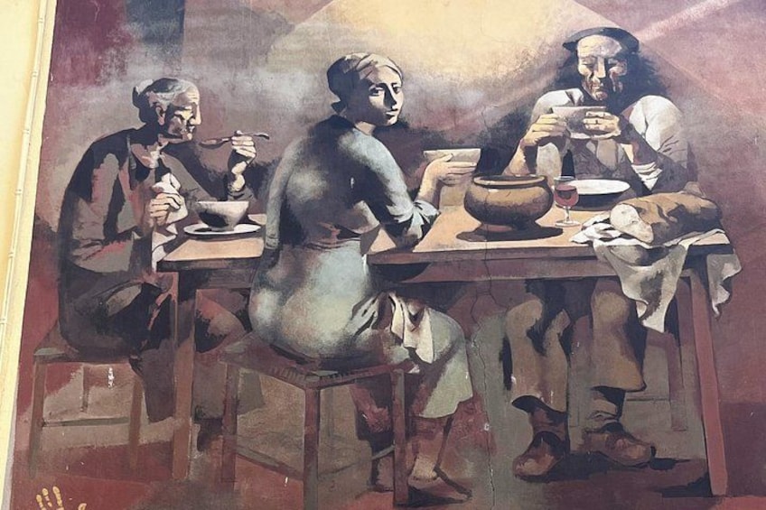 A painting of three people sitting at a table, one person is pouring a drink, and there is a pot on the table. 2