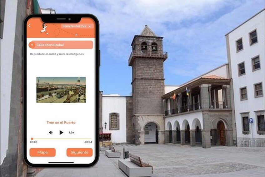 A smartphone displaying a tour guide app with a view of a historic square, a prominent tower, and a building with arches. 2