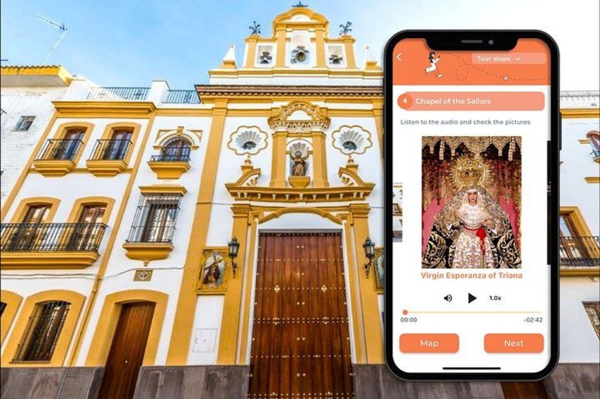 Ein Smartphone zeigt eine Touristenattraktion mit einer Gebäudefassade und einer religiösen Statue. 2