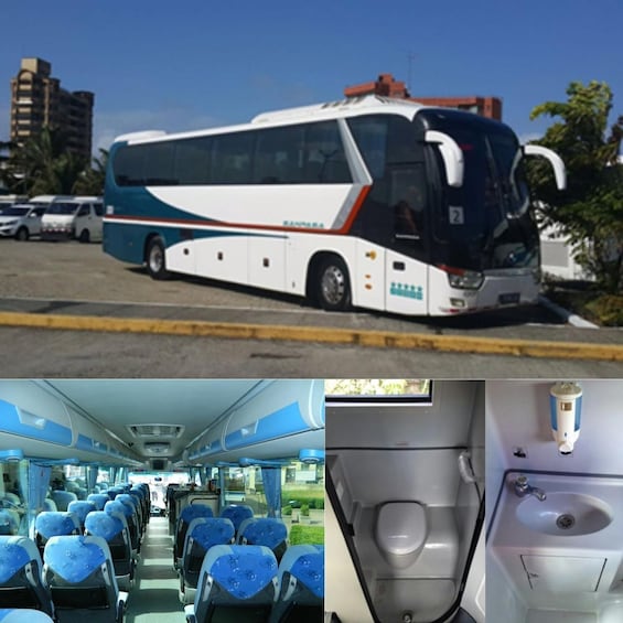 A bus parked on a street with buildings in the background. 5