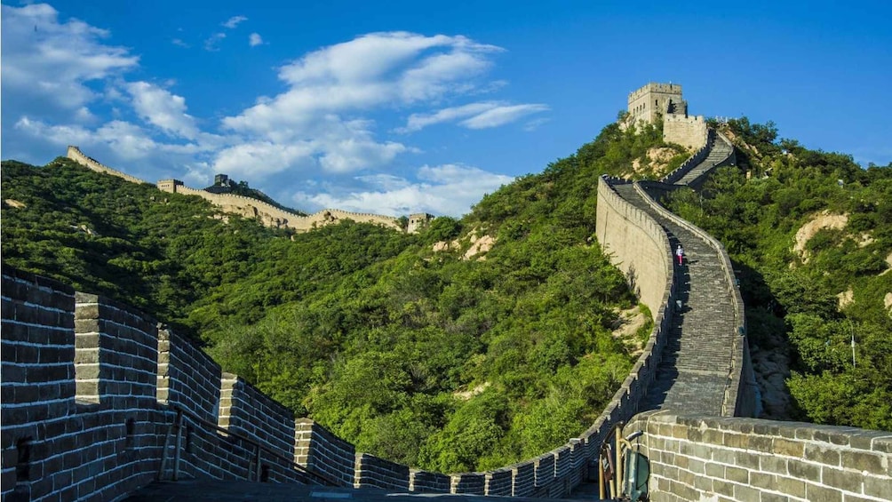 The Great Wall of China winding through a mountainous landscape. 3