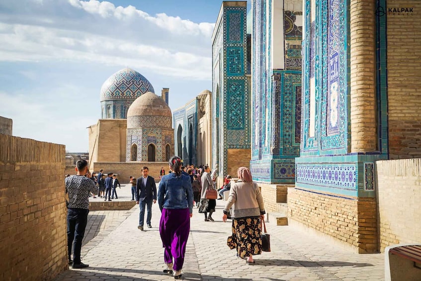 A historic building with intricate tile work and domes. 5