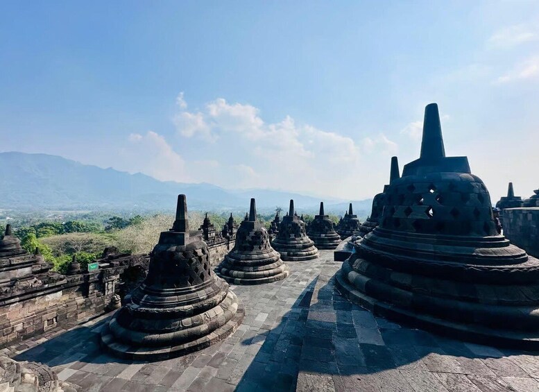 A temple complex with multiple stupa structures. 2