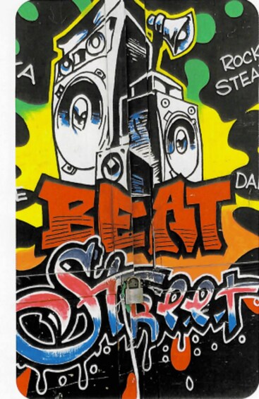 A graffiti artwork with a large speaker and the words 'BEAT' and 'Street' in bold colors. 2