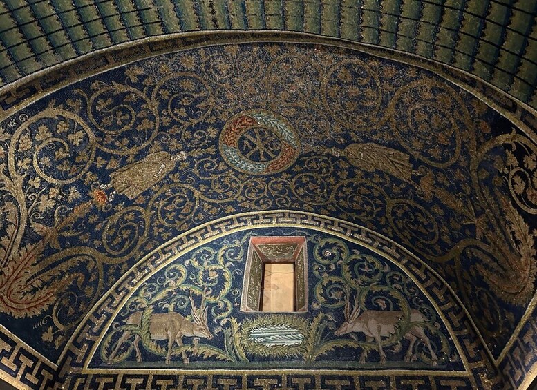A detailed ceiling mosaic with geometric patterns and animal figures. 1