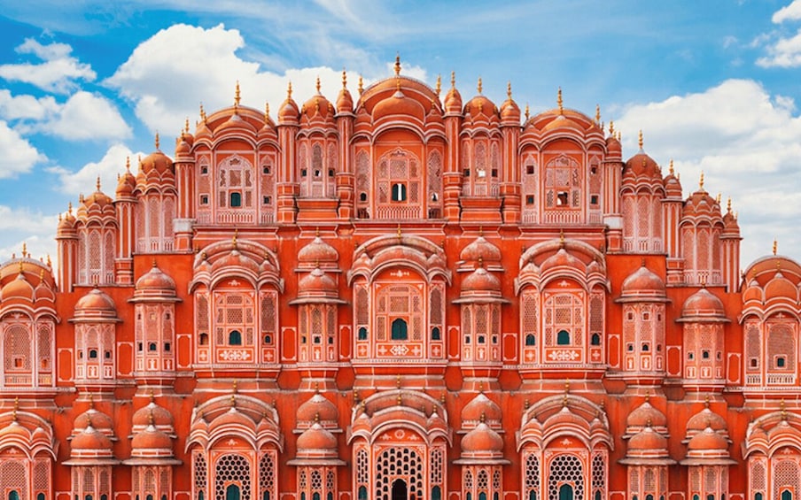 A large, ornate building with multiple domes and intricate architectural details. 2