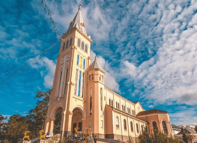 A church with a tall bell tower and arched windows. 3