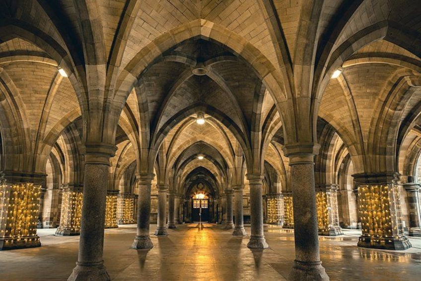 A cathedral interior with arched ceilings and rows of columns. 2