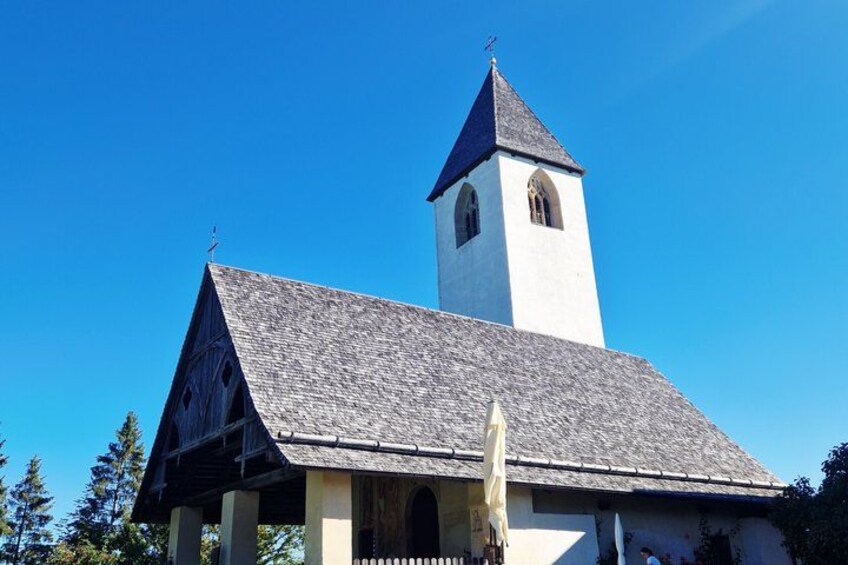 A church with a steeple and a bell tower. 2