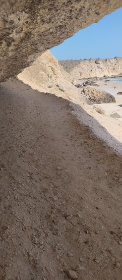 A rocky desert landscape with a clear sky. 2
