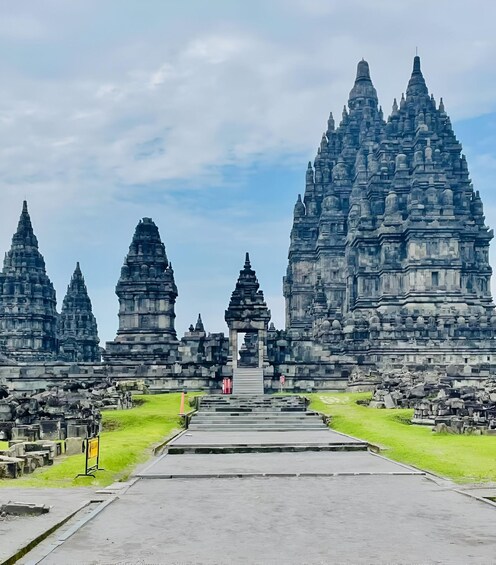 A temple complex with multiple tiered towers and a central gateway. 5