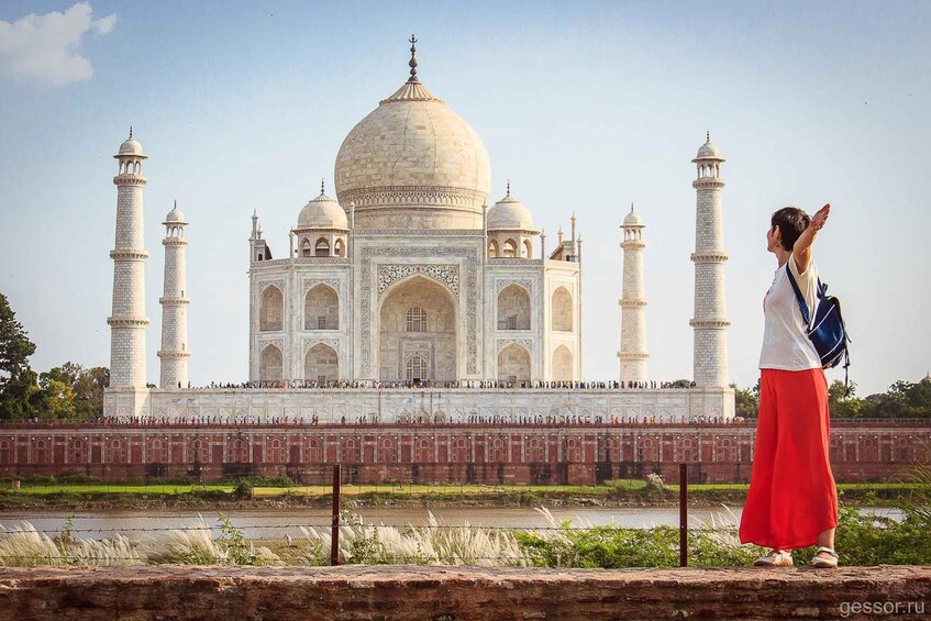 The Taj Mahal with a person standing in front of it. 1