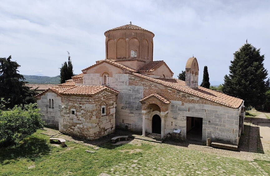 A historic church with a bell tower and a dome. 3
