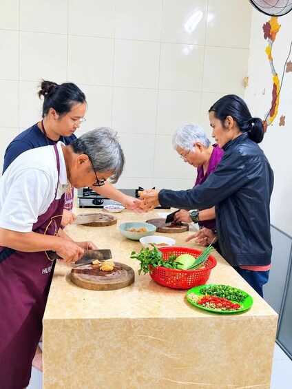Picture 7 for Activity Hue: Authentic Hue Cooking Class at a local home & market tour 3