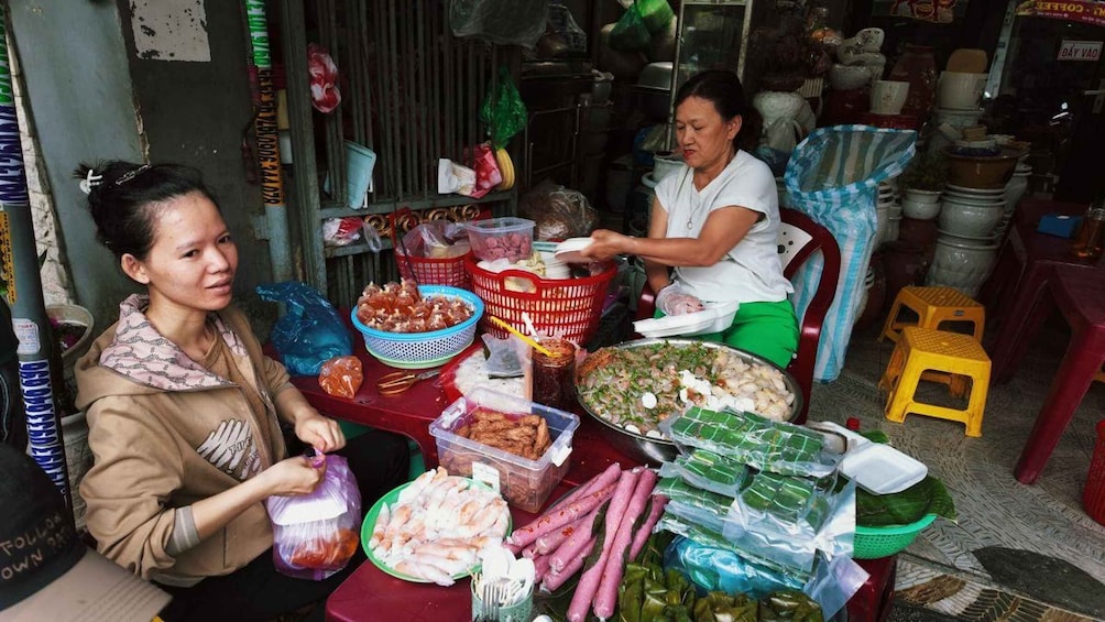 A market stall with various food items and baskets. 4
