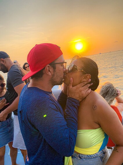 A couple embracing at sunset by the sea. 2