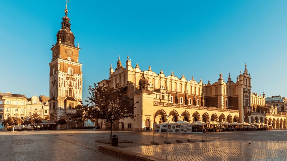 A historic building with a prominent tower and arched windows. 2