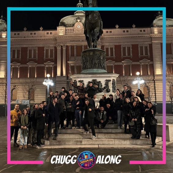 A group of people gathered around a statue in front of a building with a dome and clock. 3