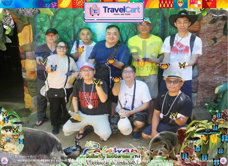 A group of people posing in front of a backdrop with a butterfly theme, holding butterfly-shaped items. 2