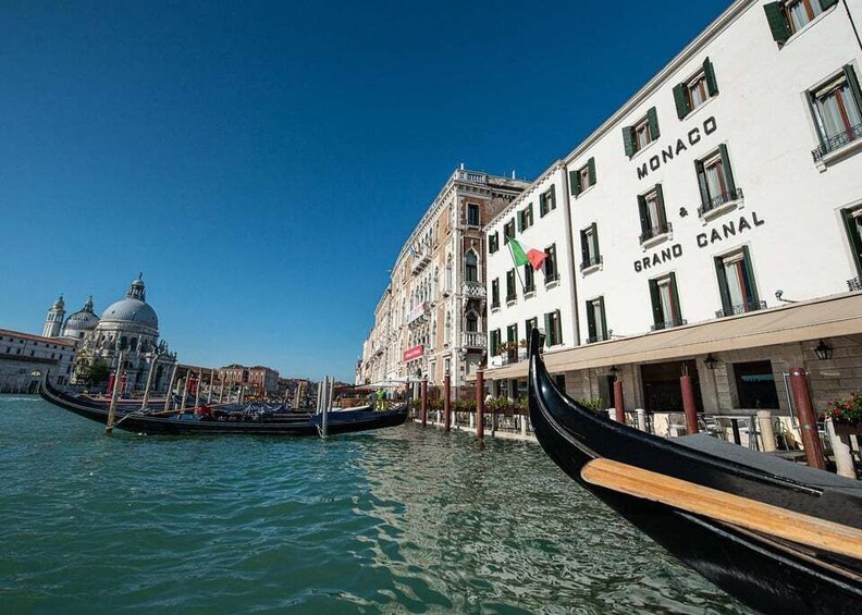 Gondolas on Venice Canal, with buildings and the Doge's Palace in the background. 1