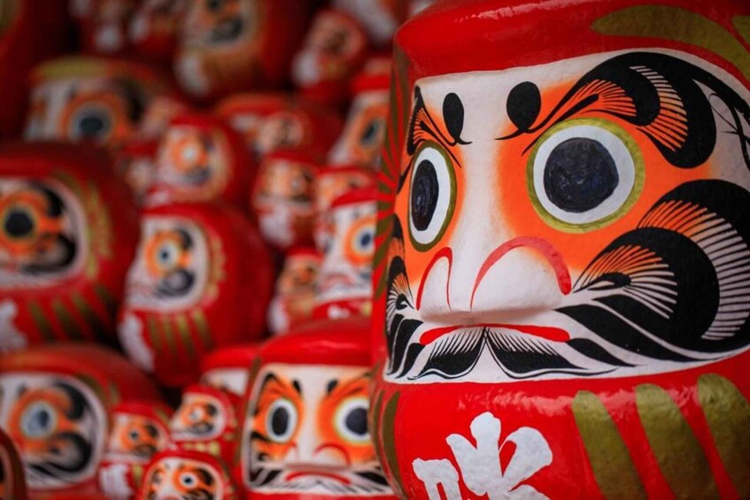 A collection of intricately painted wooden figures. 1