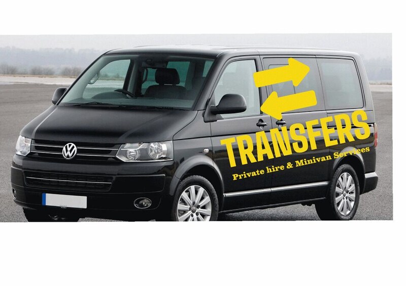 A black Volkswagen van with 'TRANSFERS Private hire & Minivan Services' written on the side. 1
