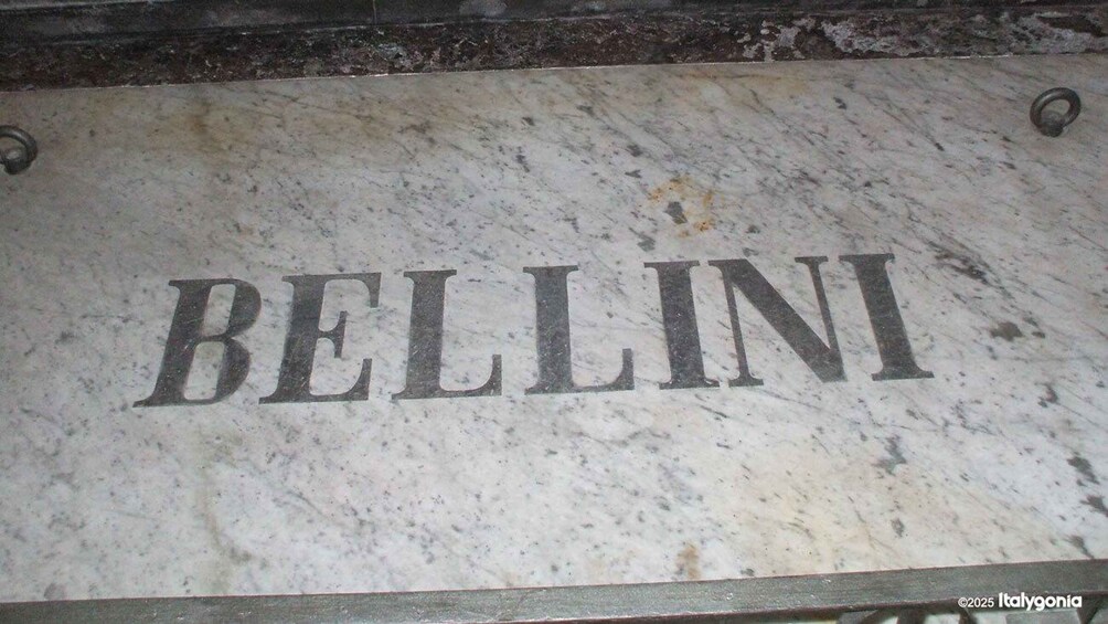 A marble floor with the inscription "BELLINI". 4