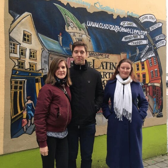 A mural with a cityscape and a sign that reads 'Welcome to the Atlantic.' 2