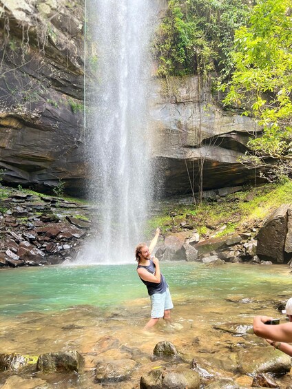 A waterfall in a rocky terrain with clear water. 4