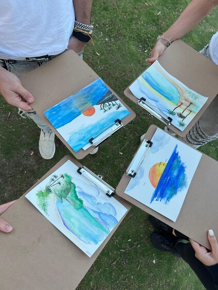 Four watercolor paintings on canvas, each secured with a clip. 4