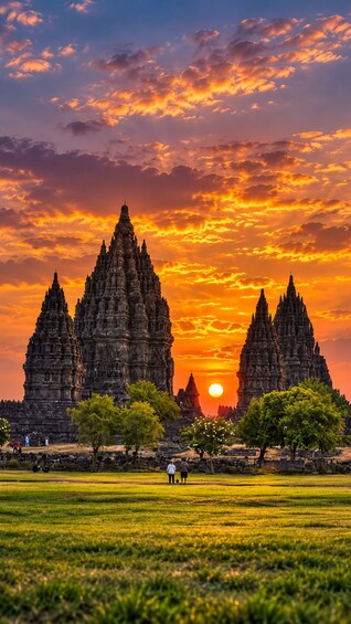 A temple complex with intricate architecture during sunset. 1