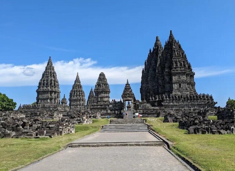 A temple complex with multiple tiered towers and a central gateway. 1